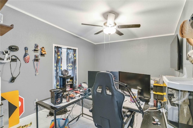 home office featuring ceiling fan, lofted ceiling, and crown molding