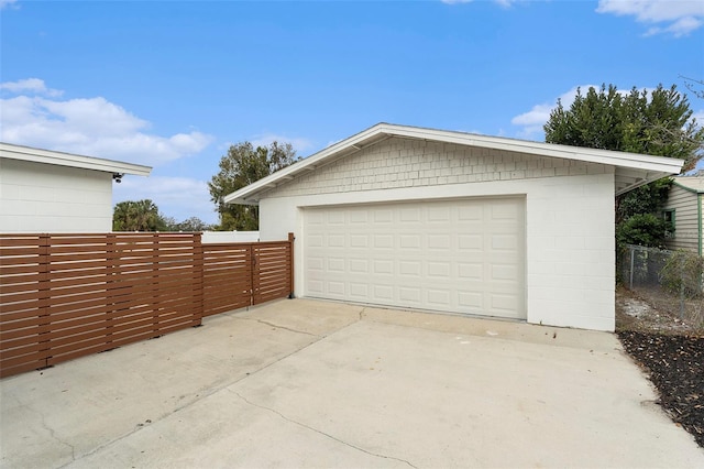 detached garage with fence