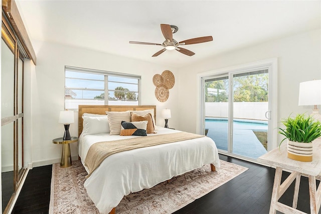 bedroom with ceiling fan, dark wood-type flooring, baseboards, and access to exterior