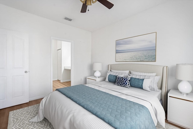 bedroom featuring light wood-type flooring and ceiling fan