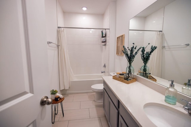 full bathroom featuring tile patterned floors, vanity, toilet, and shower / bathtub combination with curtain