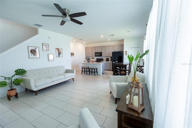11834 Brighton Knoll Loop, Riverview, FL 33579 - living room with ceiling fan, recessed lighting, and light tile patterned flooring