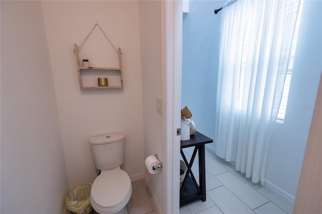 11834 Brighton Knoll Loop, Riverview, FL 33579 - bathroom with toilet and tile patterned floors
