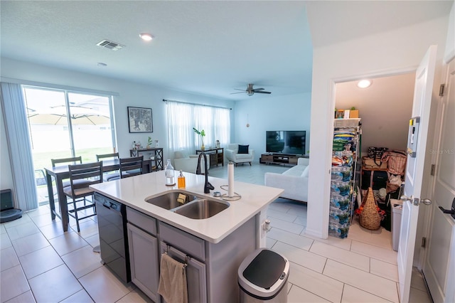 11834 Brighton Knoll Loop, Riverview, FL 33579 - kitchen with dishwasher, gray cabinetry, a ceiling fan, light countertops, and a kitchen island with sink