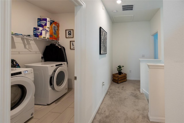 11834 Brighton Knoll Loop, Riverview, FL 33579 - washroom featuring washer and dryer, light carpet, and attic access