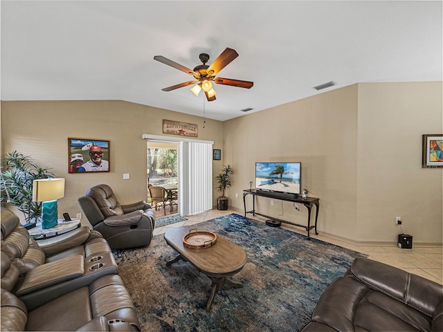 tiled living room with ceiling fan and lofted ceiling