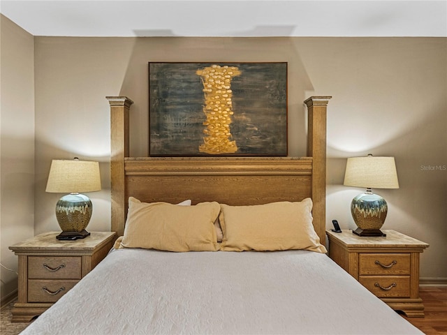 bedroom featuring dark wood-type flooring