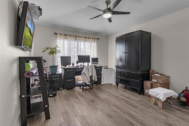 office area with ceiling fan and hardwood / wood-style flooring