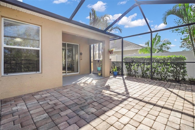 view of patio / terrace with glass enclosure