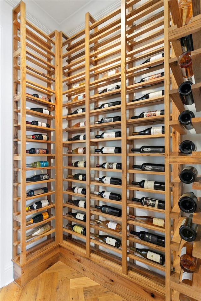 wine room with light parquet flooring