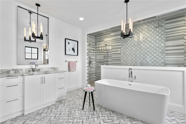 bathroom featuring vanity, shower with separate bathtub, and a chandelier