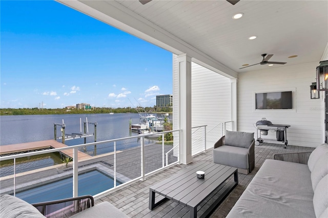 balcony with ceiling fan and an outdoor hangout area