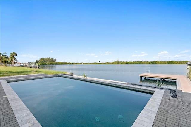 view of pool with a boat dock and a water view