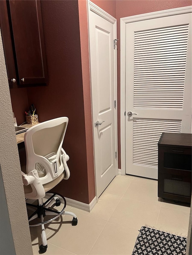 bathroom featuring tile patterned flooring