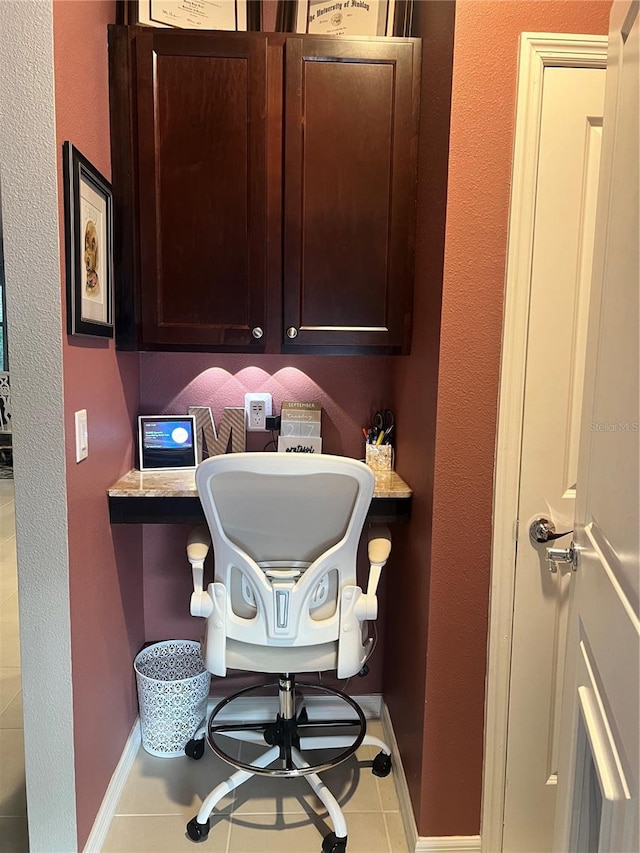 bathroom with tile patterned floors