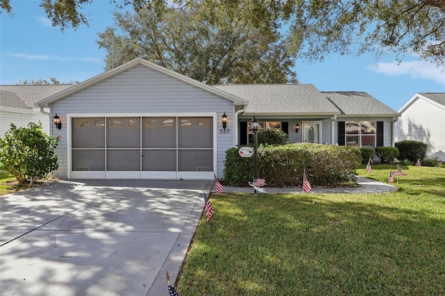 ranch-style house with a front lawn and a garage