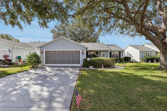 single story home featuring a garage and a front lawn