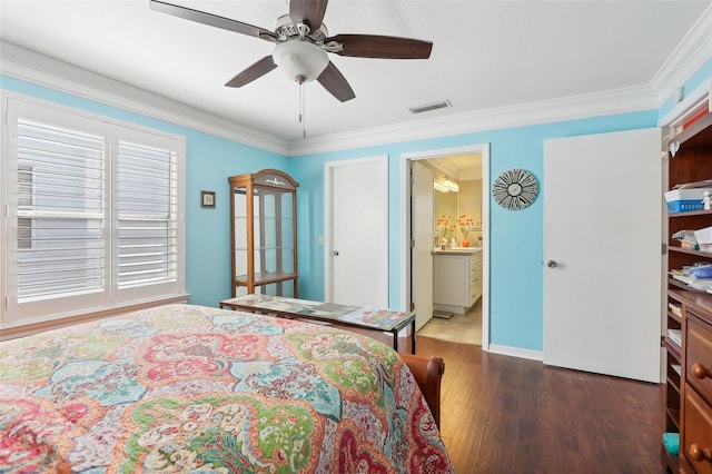 bedroom featuring ensuite bathroom, ceiling fan, crown molding, and dark hardwood / wood-style floors