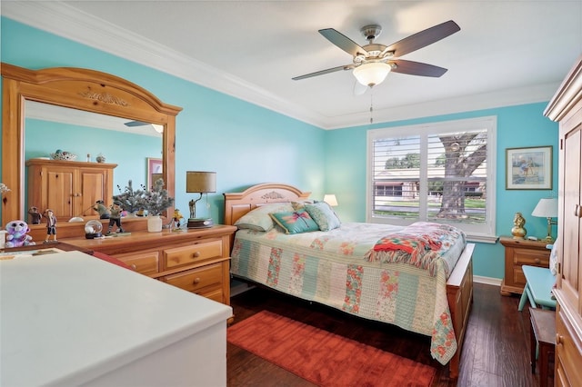 bedroom with dark hardwood / wood-style flooring, ceiling fan, and crown molding