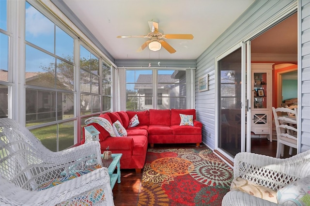 sunroom with ceiling fan