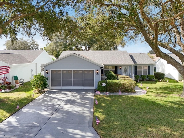 ranch-style home with a front yard and a garage