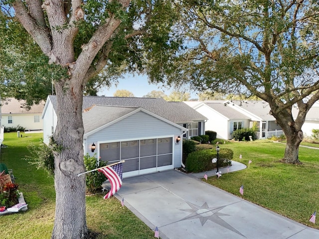 ranch-style house with a garage and a front lawn