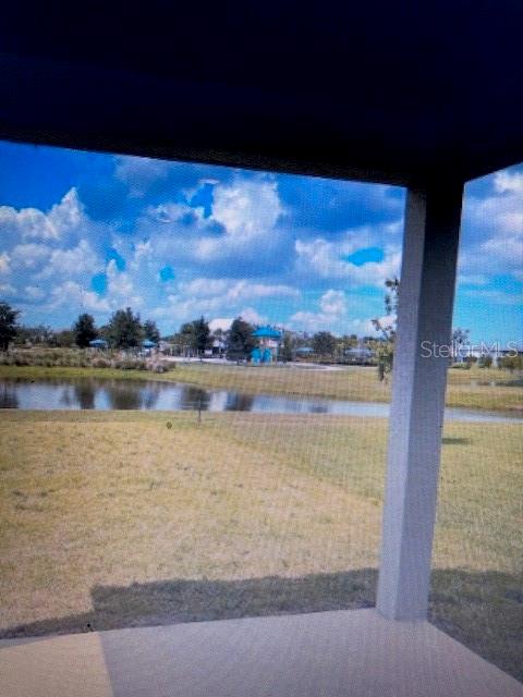 view of yard with a water view