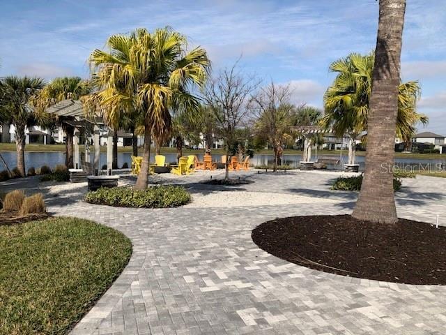 view of home's community with a pergola