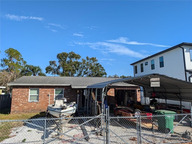 view of front of house featuring a carport