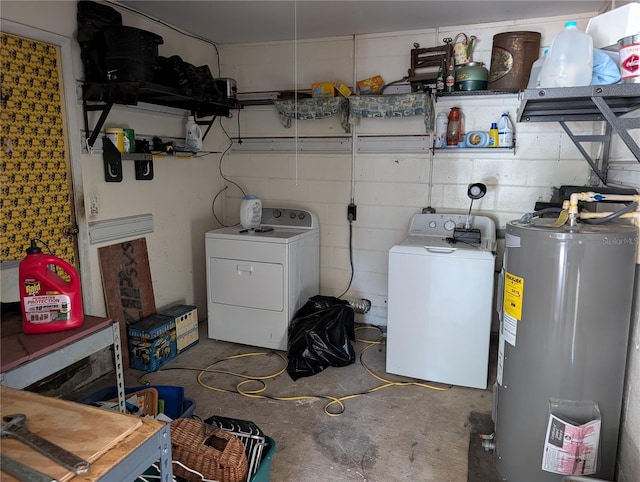 washroom featuring electric water heater and washer / clothes dryer