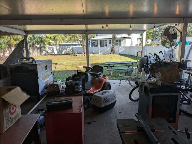 garage featuring a yard