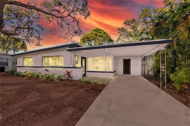 view of front of house featuring a carport