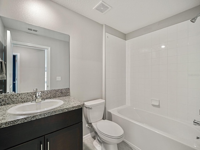 bathroom with visible vents, shower / tub combination, vanity, and toilet