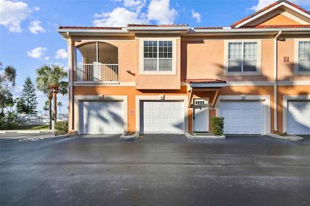 view of property with a balcony