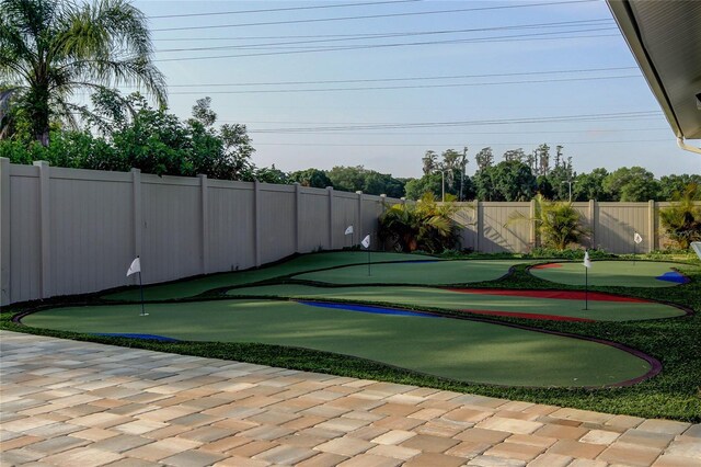 view of property's community with a fenced backyard