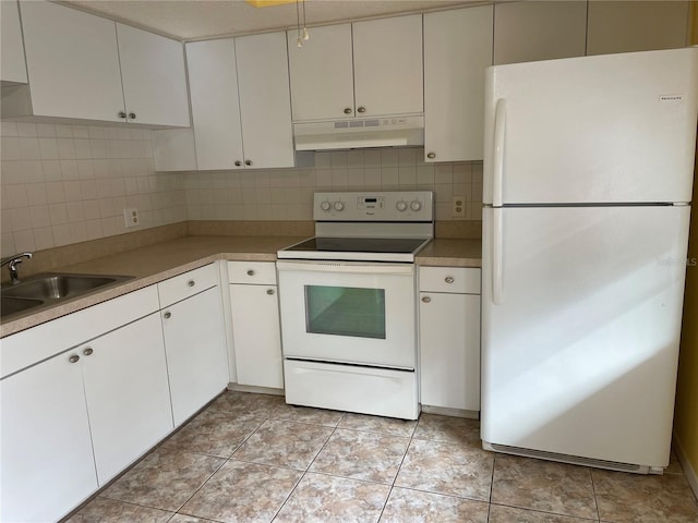 kitchen featuring decorative backsplash, white appliances, sink, and white cabinets