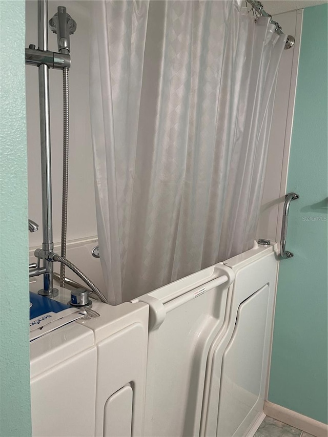 820 Virginia St Unit 207, Dunedin, FL 34698 - full bathroom with a shower with shower curtain