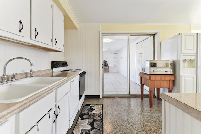 kitchen featuring white cabinets, sink, crown molding, and electric stove