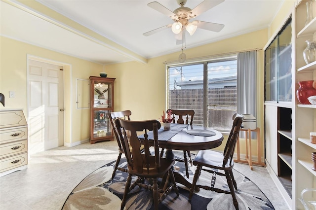 dining space with ceiling fan