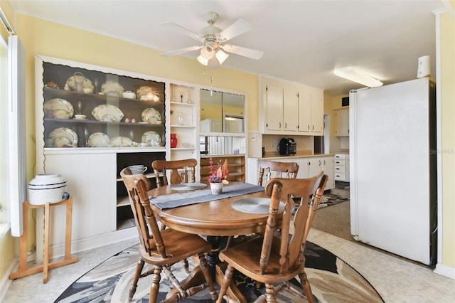 dining area with ceiling fan