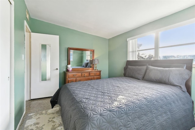 bedroom featuring a closet and carpet