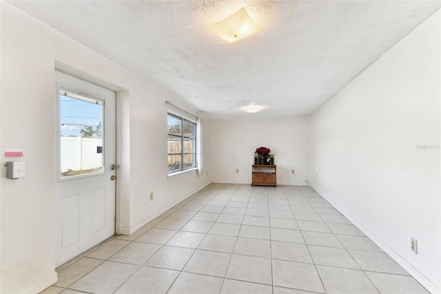 interior space with a textured ceiling