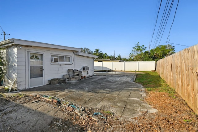 rear view of house with a patio