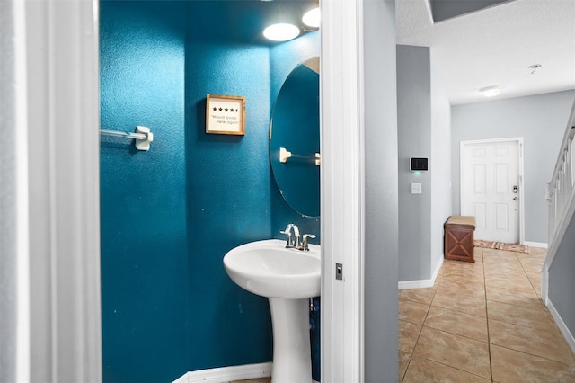 bathroom featuring tile patterned flooring