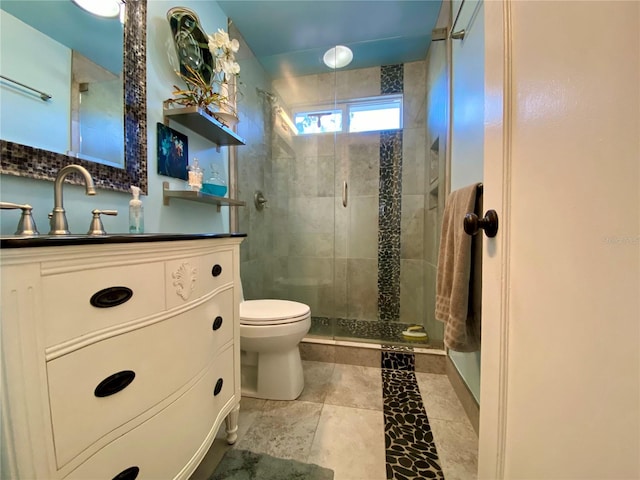 bathroom featuring sink, an enclosed shower, and toilet