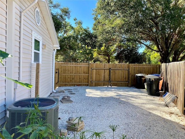 view of yard with central AC