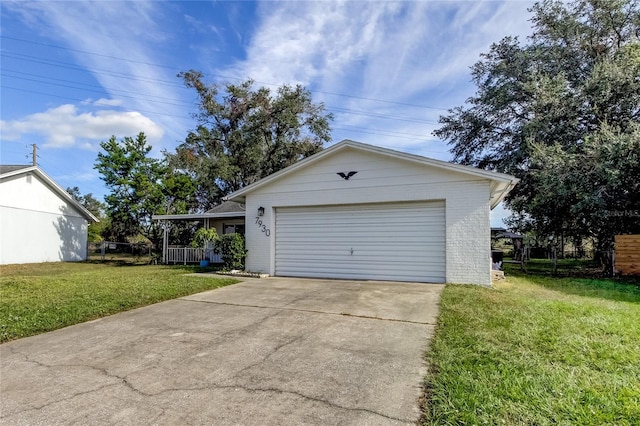 garage featuring a yard