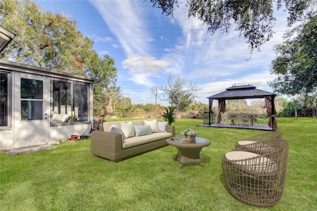 view of yard featuring an outdoor hangout area and a gazebo