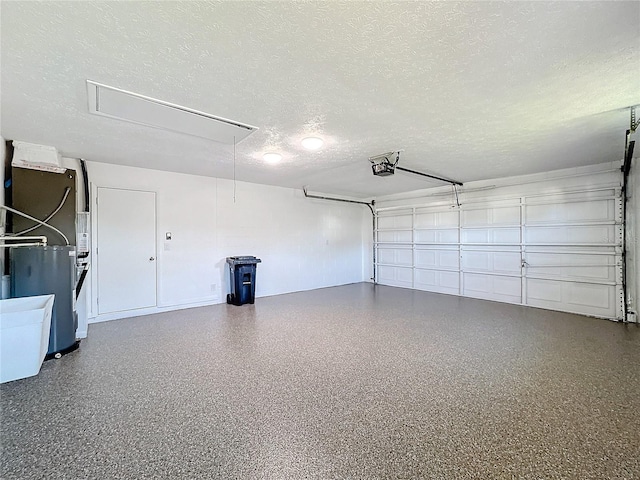 garage with a garage door opener and heating unit