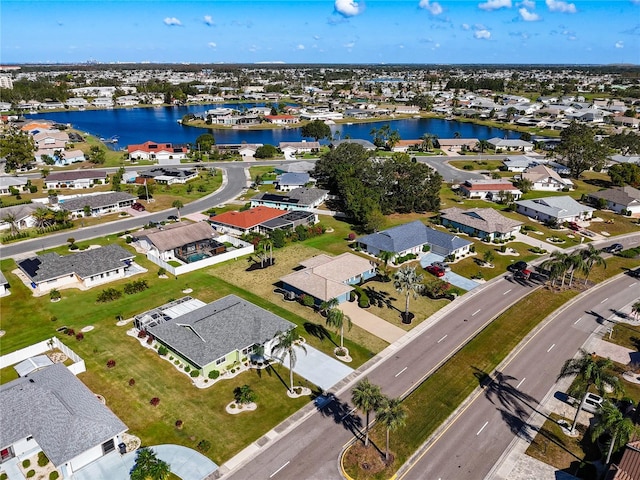 drone / aerial view with a water view